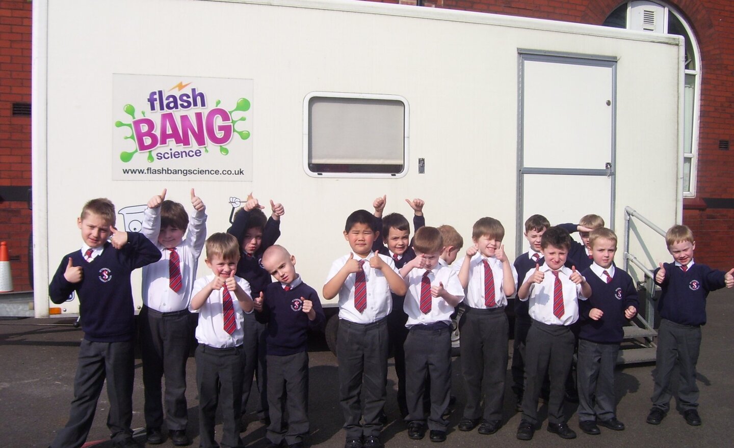 Image of Boys on the Flash Bang Experimentation Science Bus.